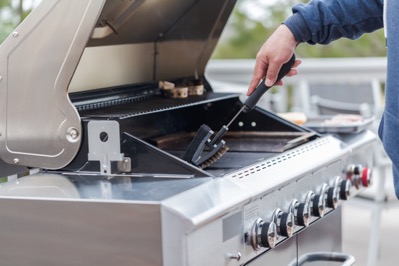 Cleaning Grill with Brush